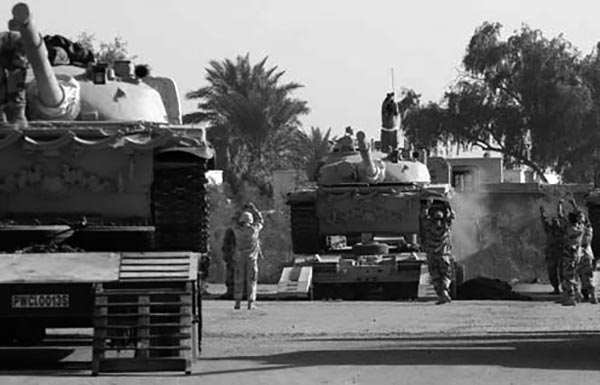Iraqi soldiers, with help from Coalition advisers, spent three days off-loading 77 T-72 tanks, which will equip the 2d Brigade.
